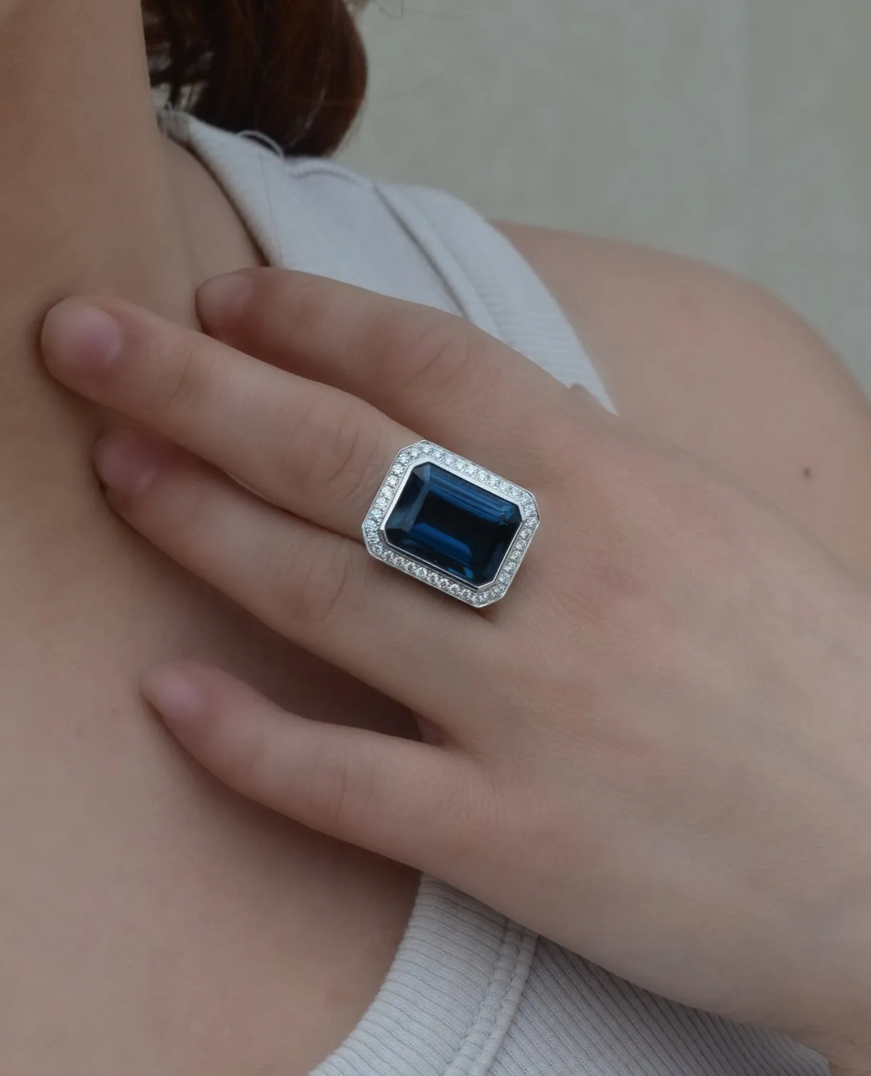 Doves Emerald Cut London Blue Topaz and Diamond Halo Ring