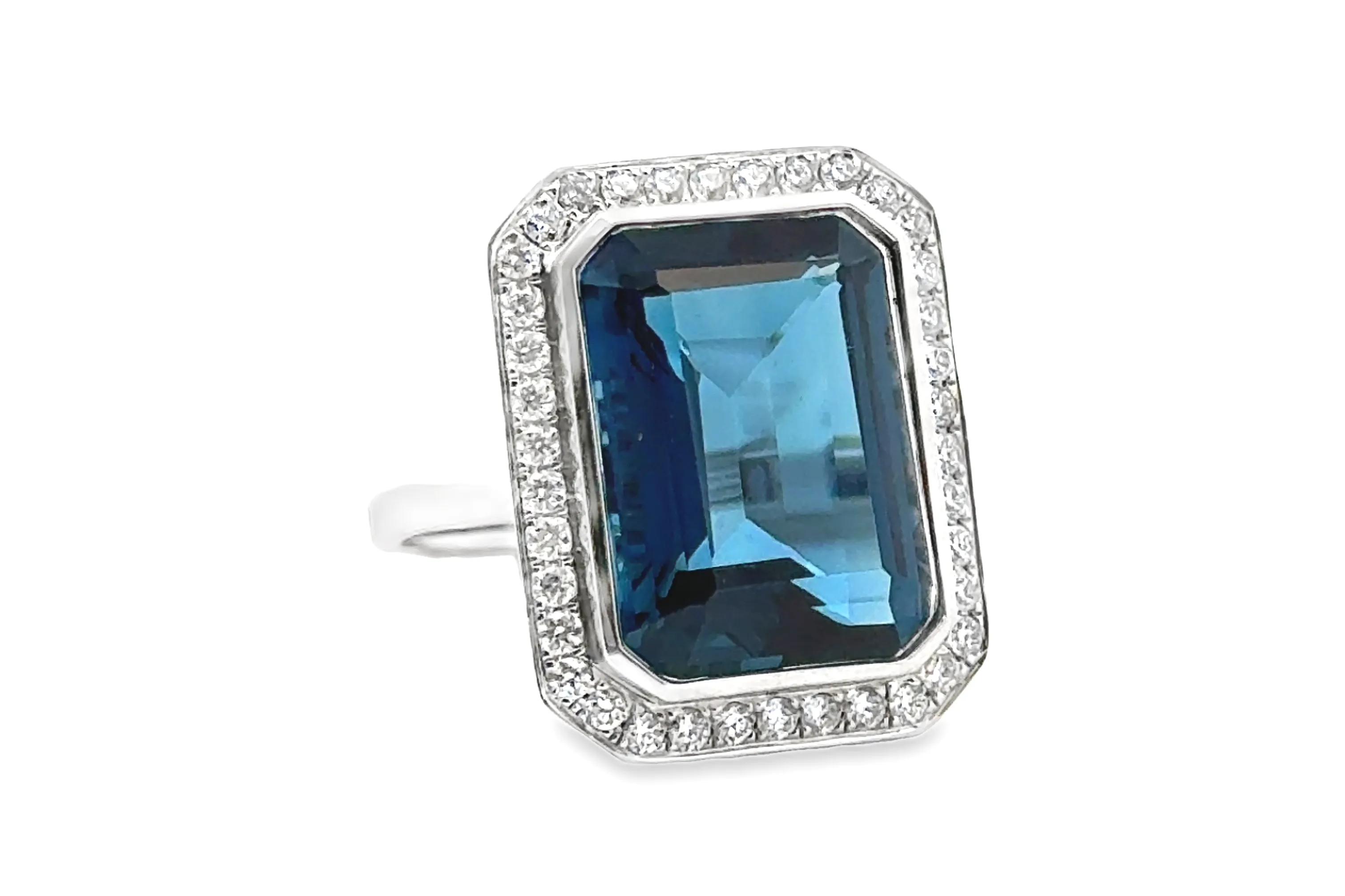 Doves Emerald Cut London Blue Topaz and Diamond Halo Ring