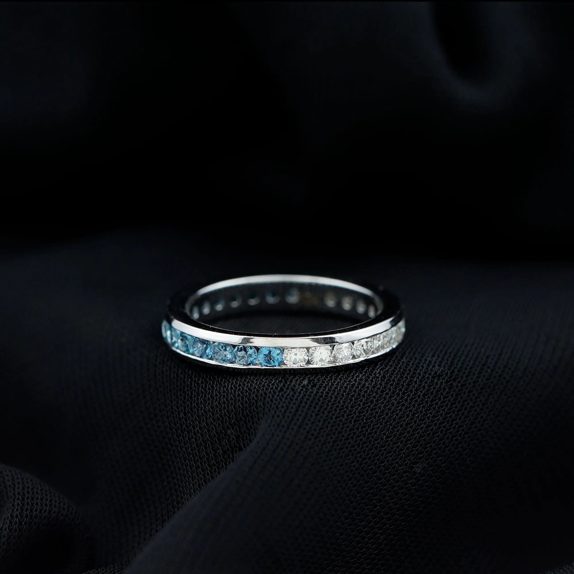 London Blue Topaz and Moissanite Eternity Ring in Channel Setting