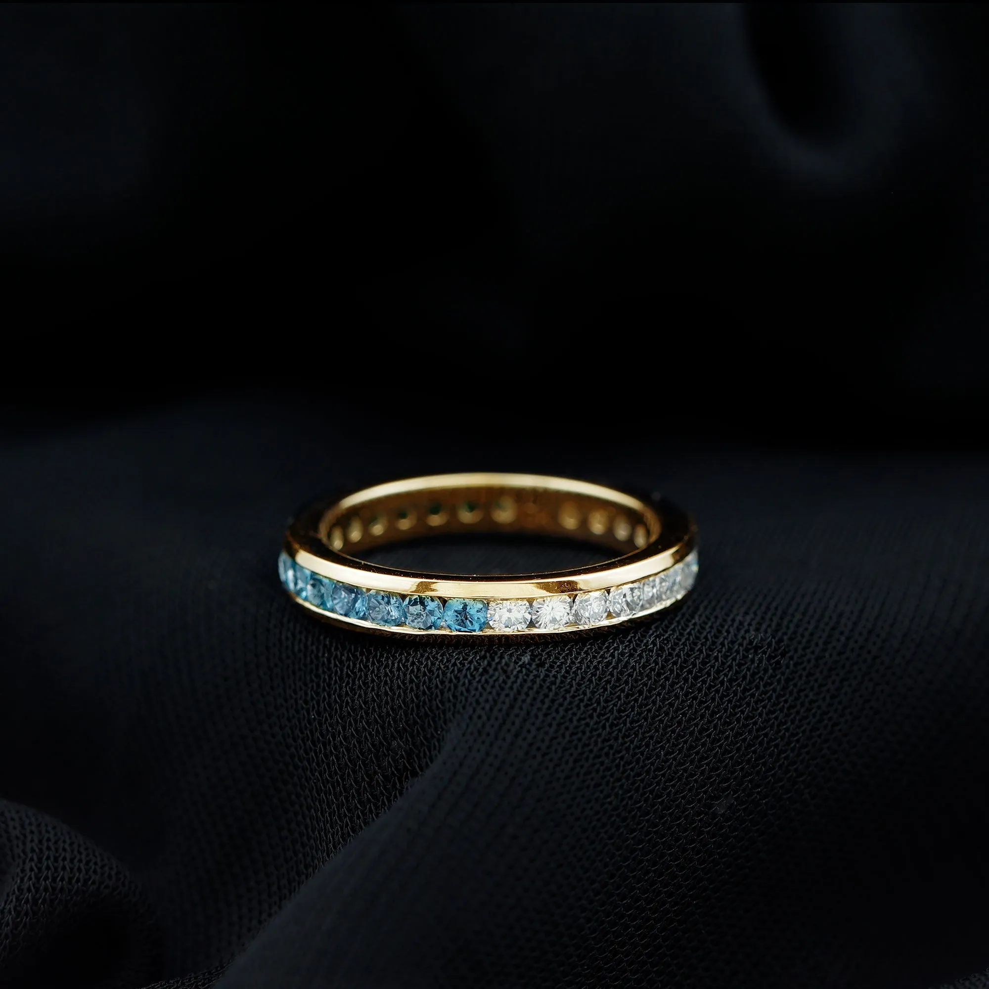 London Blue Topaz and Moissanite Eternity Ring in Channel Setting