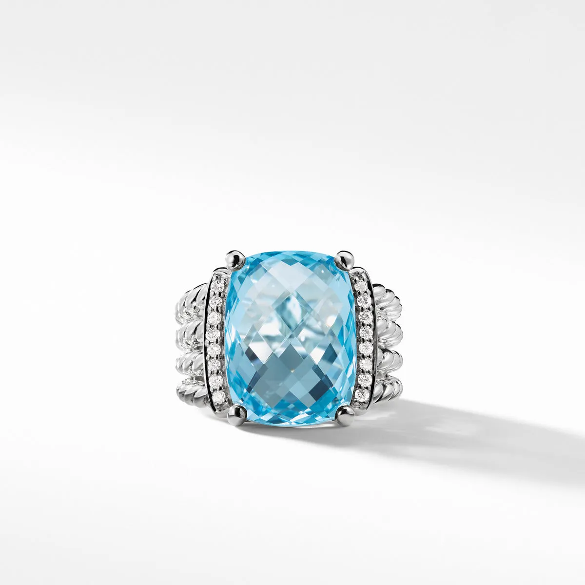 Ring with Blue Topaz and Diamonds