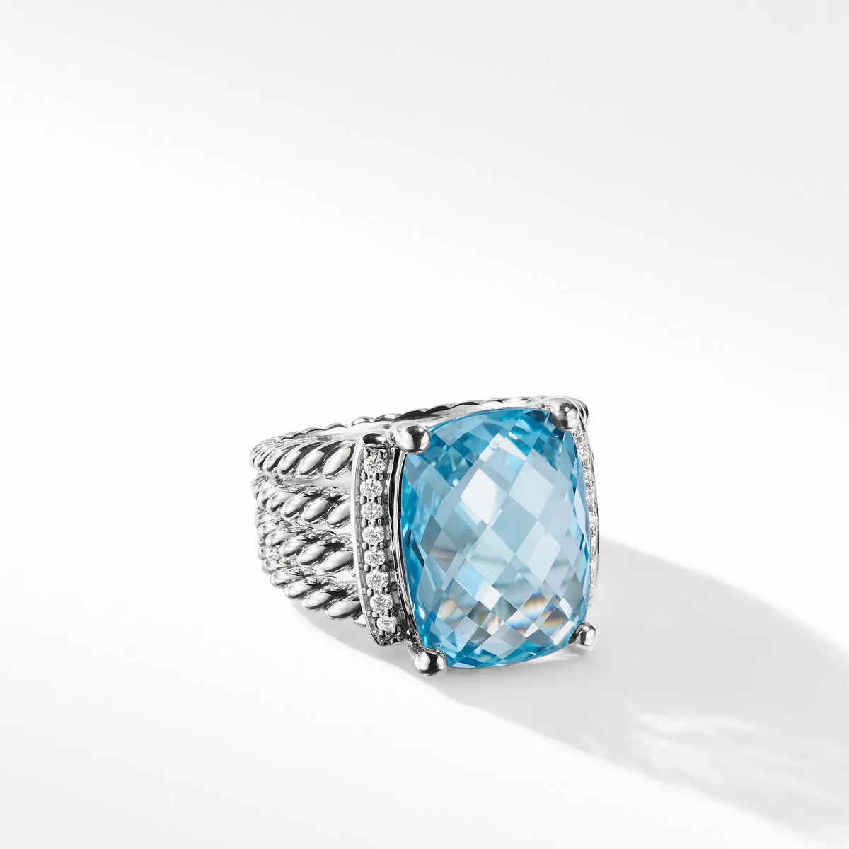 Ring with Blue Topaz and Diamonds